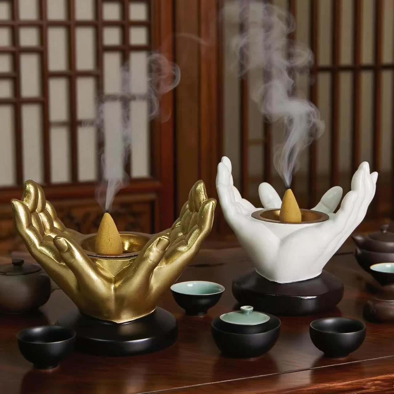 Porte-encens main Bouddha noir résine ambiance zen salon